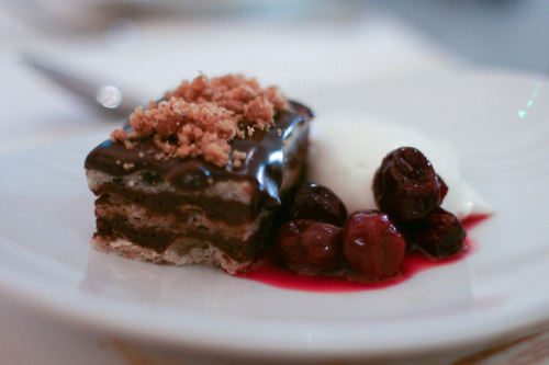 Porn f-word:  layered chocolate cake slice alongside photos