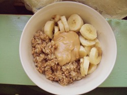 shemeanshope:  Cinnamon oatmeal with banana and peanut butter. :) 