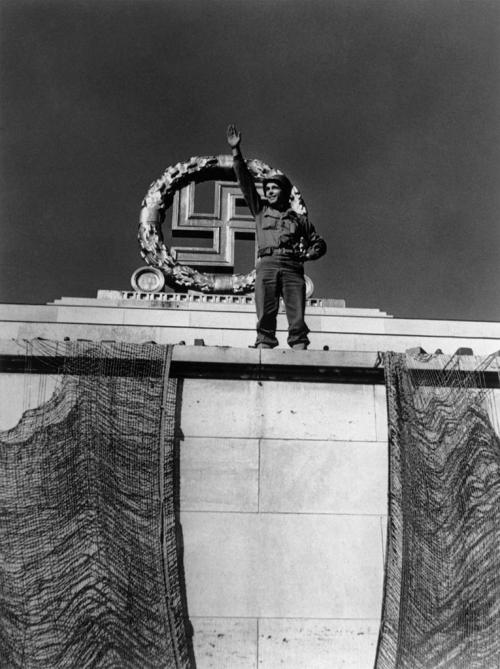 operationbarbarossa: Hubert Strickland, the driver of war correspondent Robert Capa, poses on top of