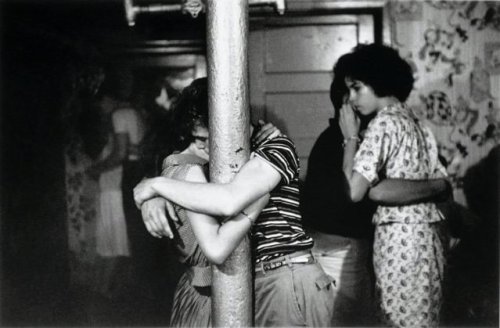 Kissing at a basement dance party, 1959