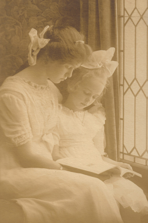 Mother and Daughter Reading. [Sisters Reading?]. Vintage photograph.  &quot;To learn to rea