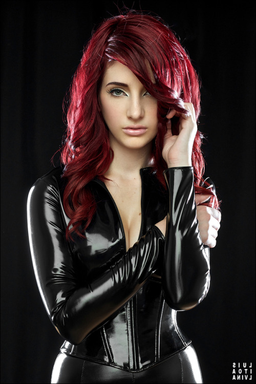 latexlatexlatex:  shakenmartini:  latexlatexlatex:  Susan Coffey in PVC. Proof that God exists.  I think my heart, brain and genitals just all simultaniously exploded.  She has that effect on men. 