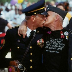  His shirt reads “They gave me a medal for killing two men, and a discharge for loving one.” 