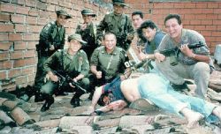 humanoidhistory:  Colombian special operations police from Search Bloc pose with the fallen Pablo Escobar. Medellín, Colombia. December 2, 1993. 