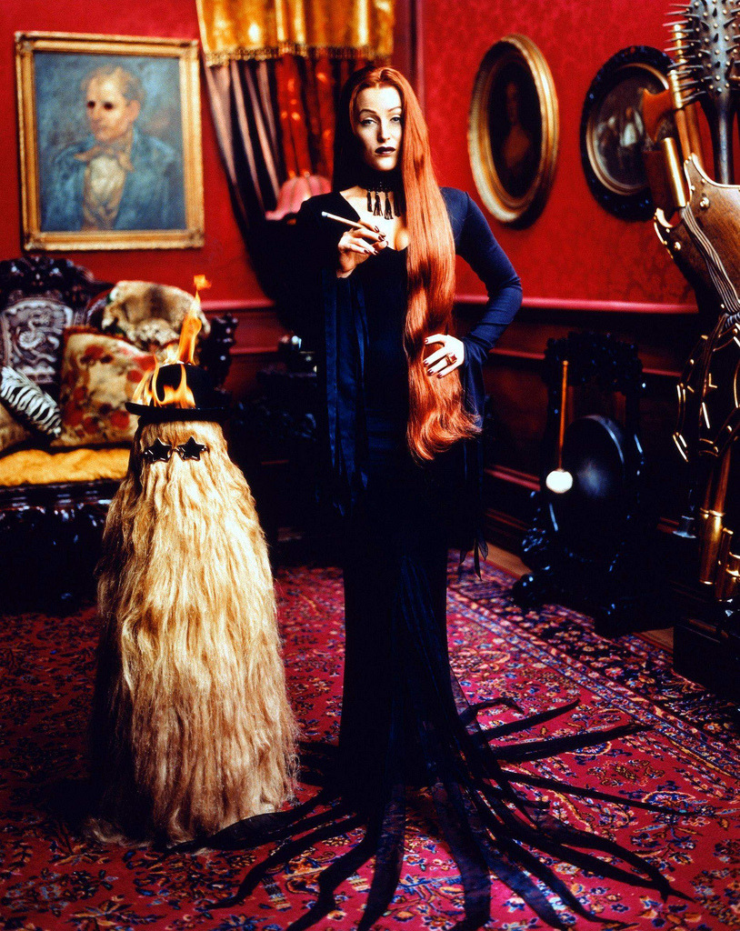 melancholyellie:lost-carcosa:Gillian Anderson as Morticia Addams. Photographed by