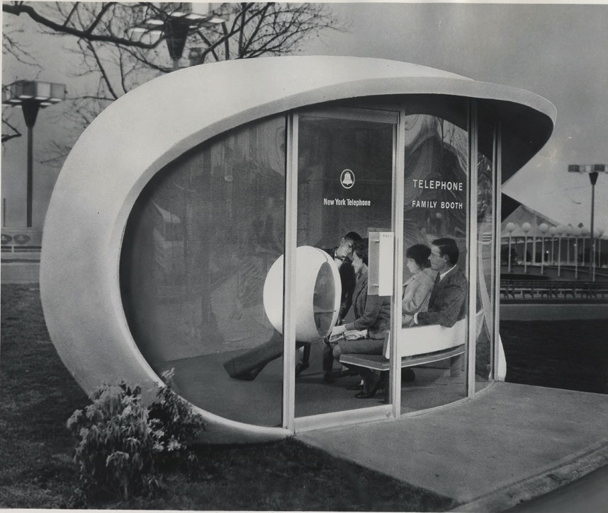 design-voyager:  Two couples in a futuristic family telephone booth at the New York