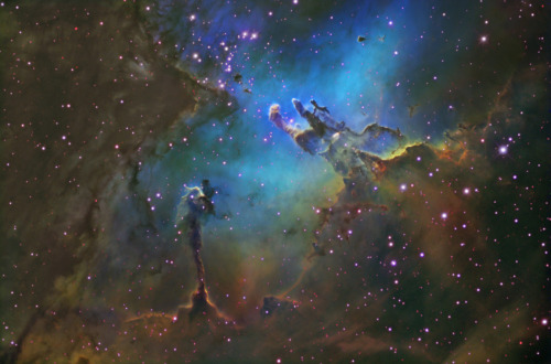      Close-ups of the Eagle Nebula’s Spire, which is 9.5 light years tall, and the Pillars of 