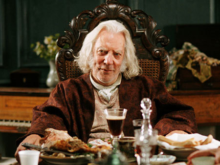 forgottenbennet:  Mr. Bennet at the table, being amused by Mr. Collins.