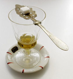 Victorianfanguide:  An Absinthe Glass And Spoon. Absinthe Was An Extremely Popular