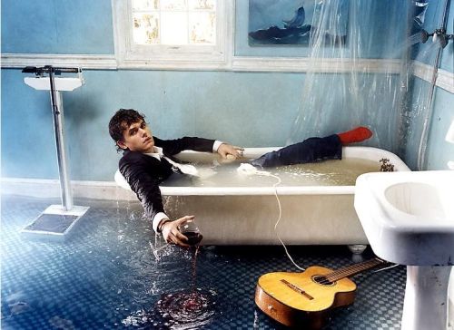 John Mayer - singer, songwriter, guitarist. In a bathtub.