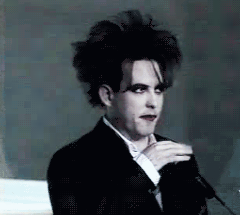 cata-cata-caterpillar-girl:stuffedtoms: The cure, one of my favorite bands of all time. he sings wit