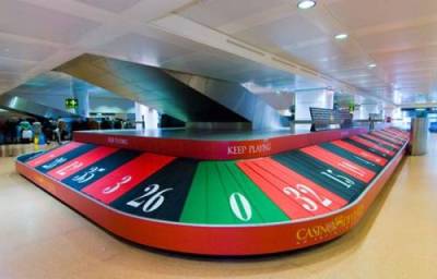 An awesome way to make collecting your luggage more exciting! Wish I’d see this for real, pretty innovative airport marketing from a Casino here.