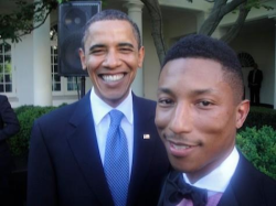 smoking-crack-with-satan:  iarmaniblanco:  Why does this picture look like Obama is Pharrell’s dad seeing him off for his Junior Prom?  is he not??? 