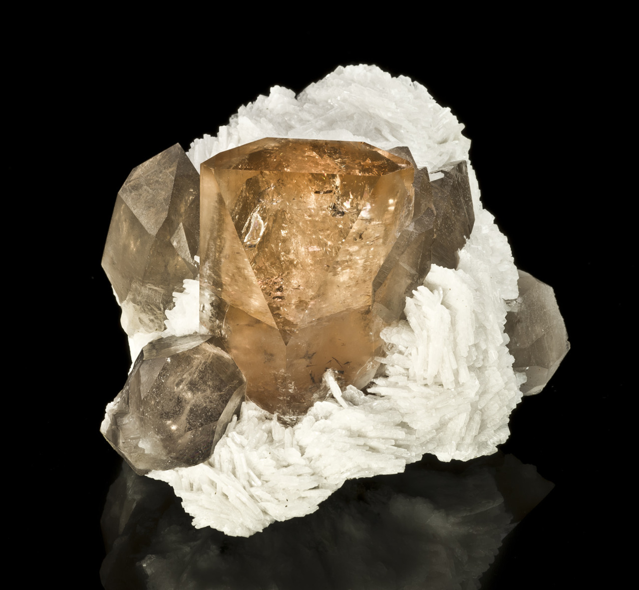 mineralia:
“ Topaz and Quartz on Albite from Pakistan
by The Arkenstone
”