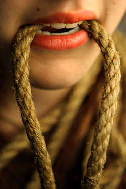 damnedbyassociation:  the taste of the rope arouses her, the anticipation and erotic nature of her bondage making her seep from her core, her submission his gift, her trust binds her heart to his,  