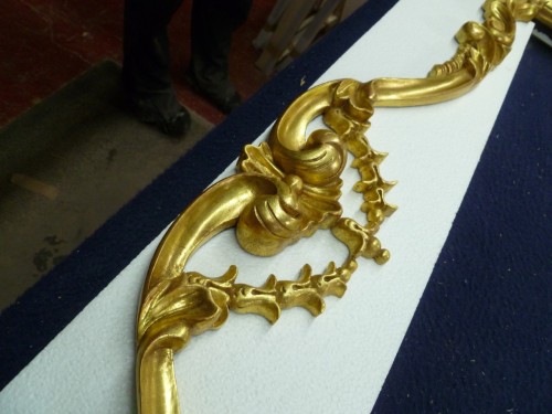 This is a customized version of C&J Frame number C718. The size is 45x99 and it will be used for a mirror. The frame is hand carved and finished in 22k gold.