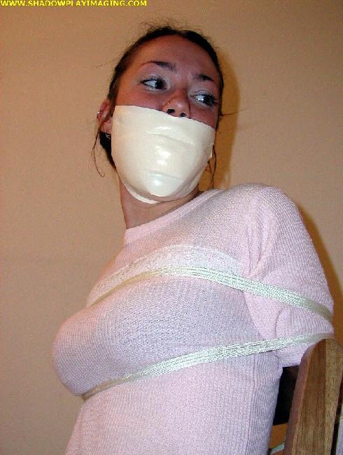 diaryofasexcrazedbbw:  Plastic tape, mouth filled to the brim. 