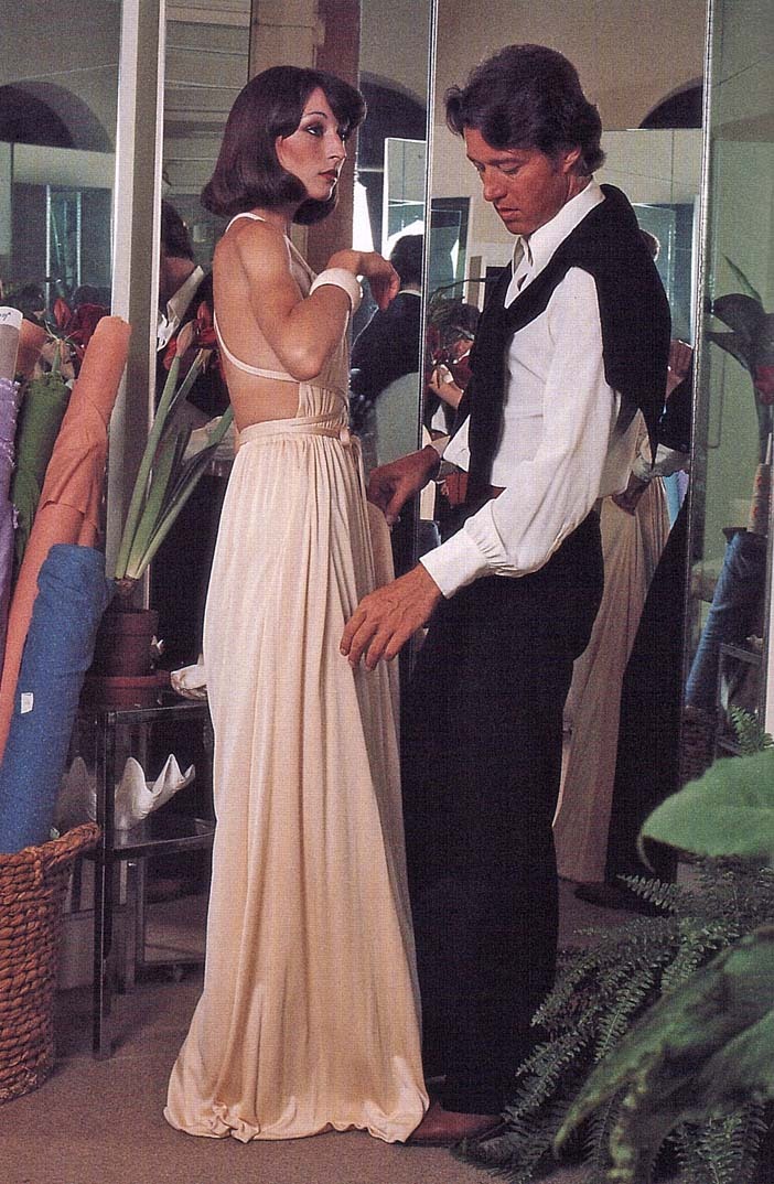 Super Seventies — Anjelica Huston being fitted in a Halston evening...