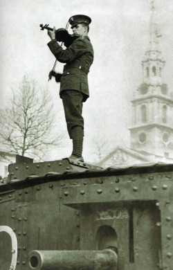  A lone Russian violinist atop a tank in