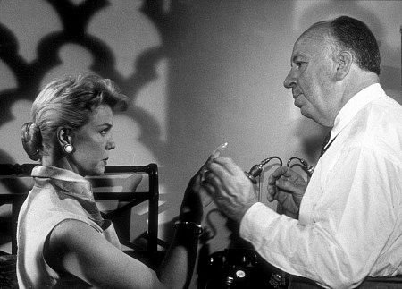 Pictured above: Sir Alfred Hitchcock, holding a lady’s hand for the greater good.