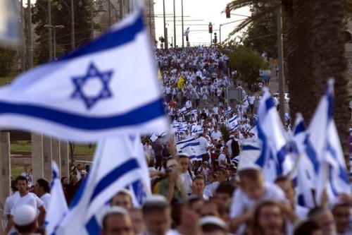 israelfacts: Thousands of Israelis march outside the old city of Jerusalem on May 20, 2012, as they 