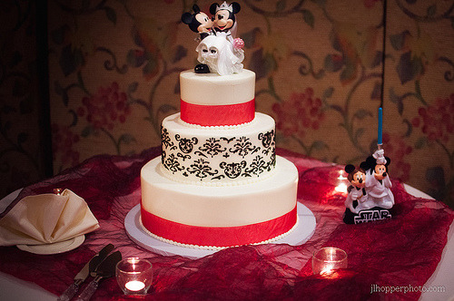 wedding cake with disney toppers (by JL Hopper Photography)