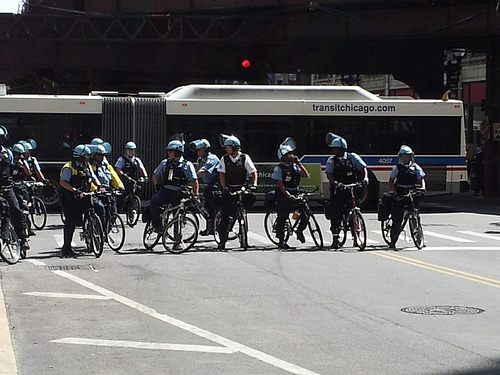 fictionthatmatters:
“ A scene from the NATO protests in Chicago as a bicycle patrol of police prepare to mobilize.
20120518_144117 (by acluofil)
”