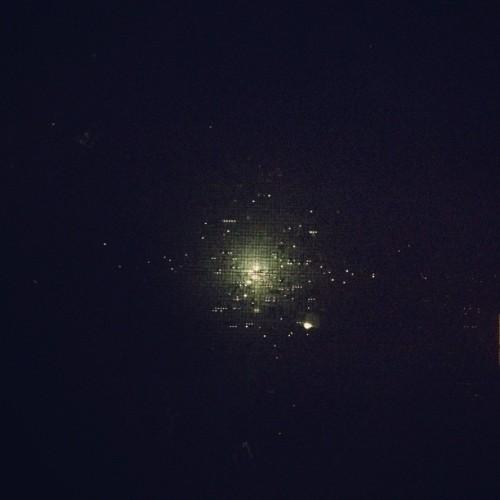 Raindrops on the screen and a street light. (Taken with instagram)