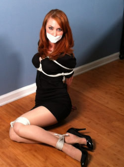 auctionhouse69:  gagsrus:  Love a good tape gag  In order to prevent downsizes, this export company will begin to offer sex slaves to all their clients. Starting with the export company’s secretary. 