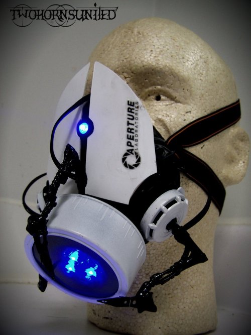 otlgaming:  APERTURE SCIENCE PORTAL GUN THEMED GAS MASK TwoHornsUnited made this Aperture Science Portal Gun themed gas mask for cosplayers and gas mask enthusiasts.  This inventive use of the Handheld Portal Device will be sold at Tampa, Fl’s Metrocon