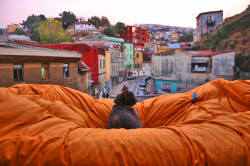caturday:  My baby cat Chloé using my comforter hanging on my clothesline as a hammock, enjoying the beautiful view of Valparaíso, Chile :3
