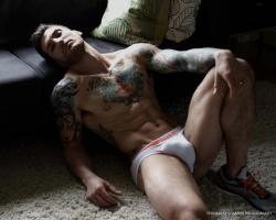 humplex:   Tattooed muscle stud. 