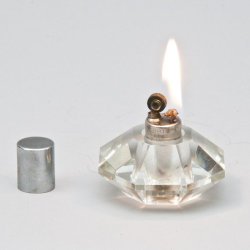 bucklictic:Vintage Art Deco 30s Octagonal Crystal Lighter from LuminousWhatnots