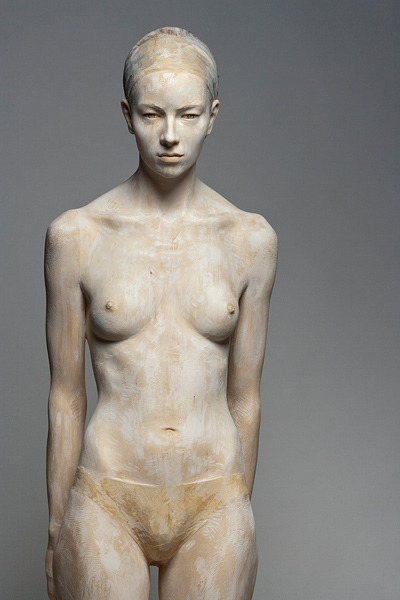 manfiction:  iamfree-butiamflawed:  caitoooo:  imgoverdose:  Eerily realistic figures, carved from wood.more awesome here   beautiful.  I THOUGHT THESE WETRE JUST NAKED PEOPLE WITH PAINT ON THEM 