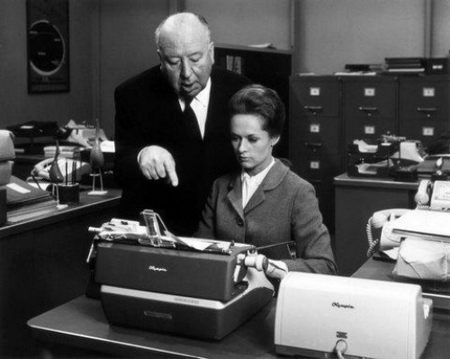 Pictured above: Sir Alfred Hitchcock, mansplaining the fine points of typing a letter to Tippi Hedre