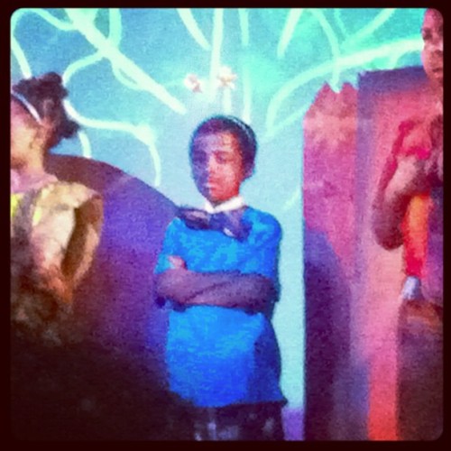 Low light shot from the audience of Amin as a munchkin in his school’s production of “The Wiz”.  (Taken with instagram)