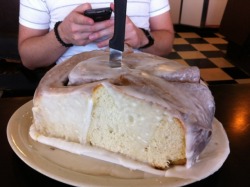 Taking on the 3 pound cinnamon roll challenge at Lulu&rsquo;s Bakery &amp; Cafe.