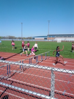 Baby sister at her track meet. Proudest brother ever. I was the fastest sprinter in my hs. Time to pass the baton. lol