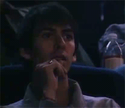 Dhani Harrison watching his father George Harrison on screen. 