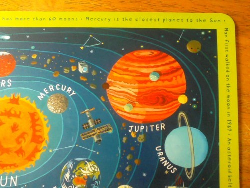 rubywhiterabbit:  My little brother got into outer space and stuff so my step-mom bought him a place mat with all the planets on it. When I first saw it, I was upset, because it was newer and so Pluto wasn’t labeled. I was about to say something when