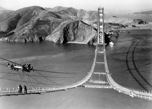 theatlantic:  In Focus: The Golden Gate Bridge Turns 75  Sunday marked the 75th anniversary of the opening of San Francisco’s Golden Gate Bridge. Before 1937, the city’s growth was hampered by a reliance on ferry traffic. The 8,981 ft (2,737 m)
