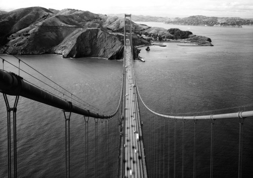 theatlantic:  In Focus: The Golden Gate Bridge Turns 75  Sunday marked the 75th anniversary of the opening of San Francisco’s Golden Gate Bridge. Before 1937, the city’s growth was hampered by a reliance on ferry traffic. The 8,981 ft (2,737 m)