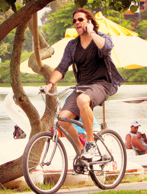 inyourpassengerseat:   #Hello? #OH HAY GURL HOW YOU DOIN #NOT MUCH WITH ME EITHER I’M JUST HERE IN BRAZIL RIDING A BIKE AFTER I KILLED HALF THE FEMALE FANBASE WITH MY TRIP TO THE FUCKING BEACH #NBD 