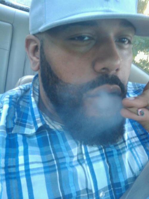 tastyblkman:  Sexy Bear..  Love that beard.. 