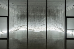 razorshapes:  Osaka-based artist Yasuaki Onishi uses humble, simple materials – black glue, plastic sheets, nylon thread – but somehow a large space is majestically occupied with his inverted landscapes, the “reverse of volume”, allowing a viewer