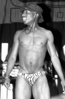 nakedcelebrity:  Even though he’s not completely naked…mr. Tupac Shakur