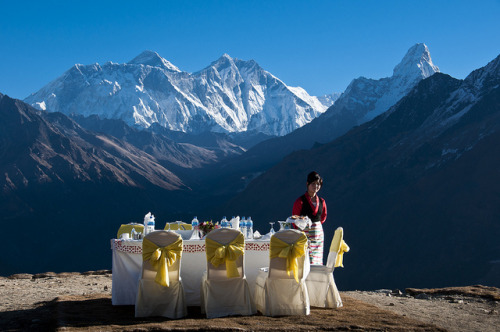 Table with a view with Mount Everest in the background at Yeti Mountain Lodge, Nepal (by David Ducoi