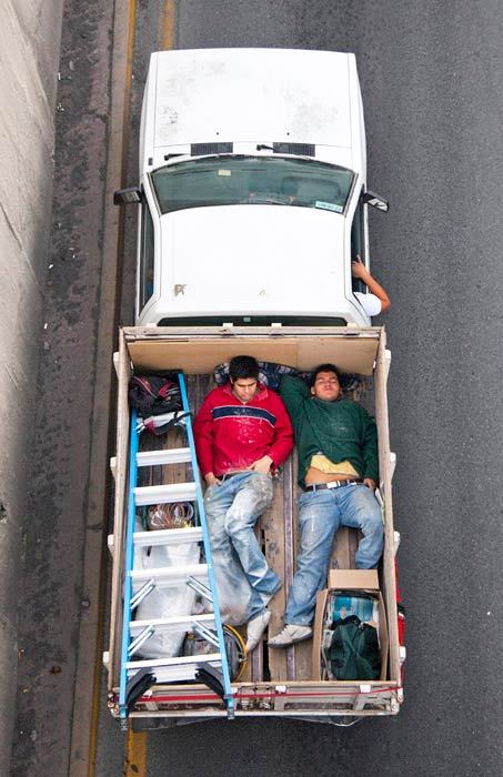 bearpope:  Alejandro Cartagena captured Mexican workers on their way to job sites in Car Poolers. This is such an amazing and simple photo series.  