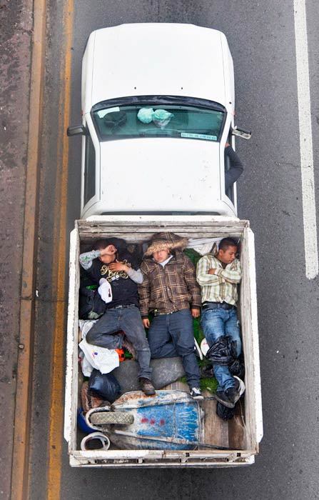 bearpope:  Alejandro Cartagena captured Mexican workers on their way to job sites in Car Poolers. This is such an amazing and simple photo series.  