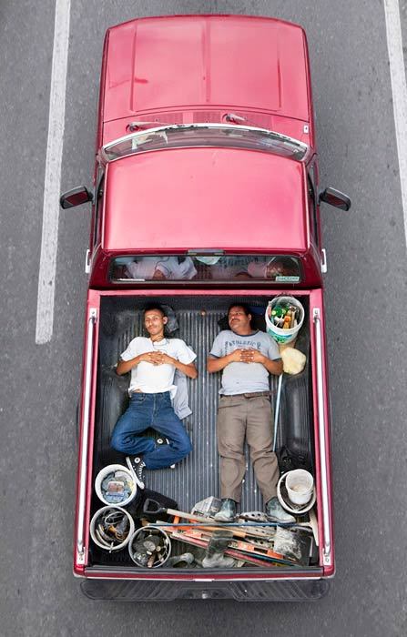 bearpope:  Alejandro Cartagena captured Mexican workers on their way to job sites in Car Poolers. This is such an amazing and simple photo series.  